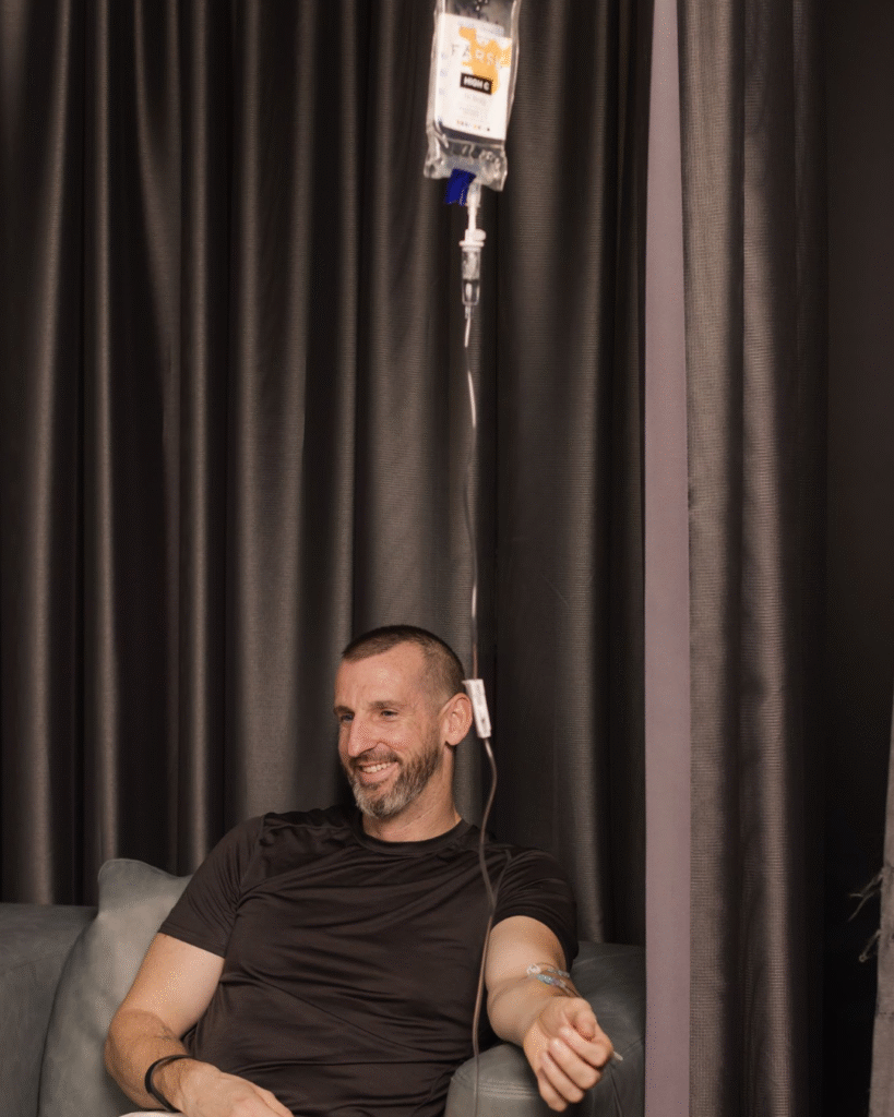Man getting IV therapy at trove